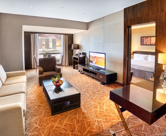 Premier Deluxe Suite Living Room Peninsula Excelsior Hotel Singapore 